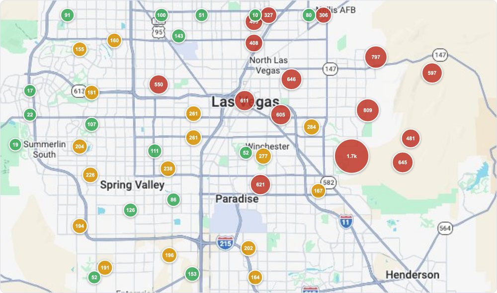 Map of the Las Vegas valley with a circle over each zip code. Circle size and color show how many students came from that zip code, from small green circles in outlying areas to large red circles east of the Strip.